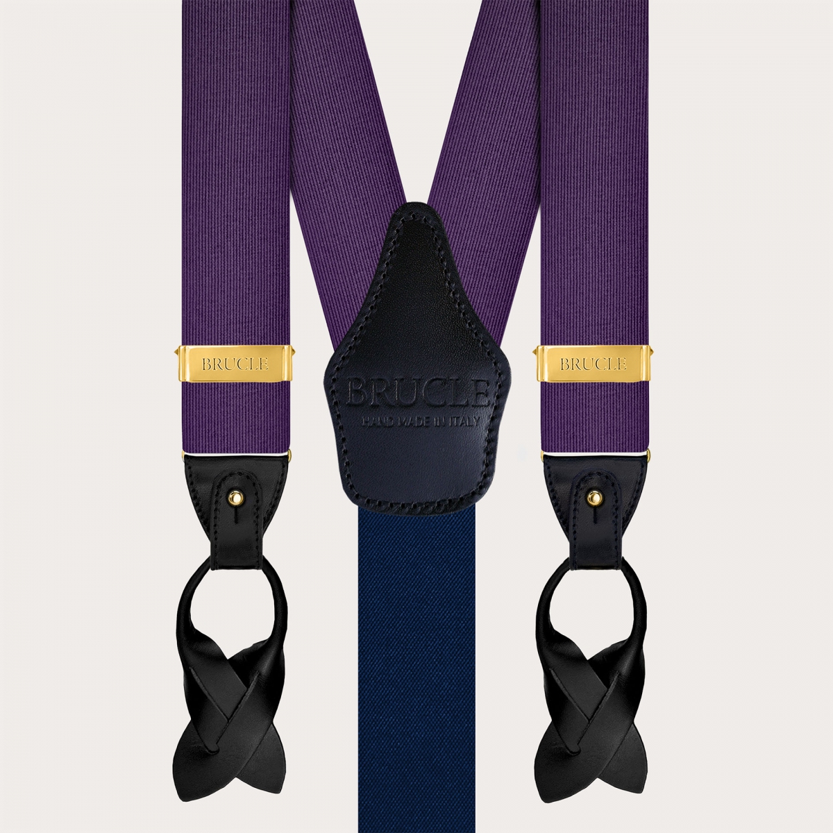 Purple silk men's suspenders with gold metal parts for clips or buttons.