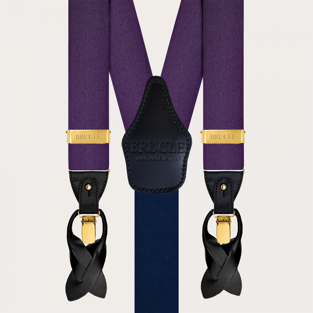 Purple silk men's suspenders with gold metal parts for clips or buttons.