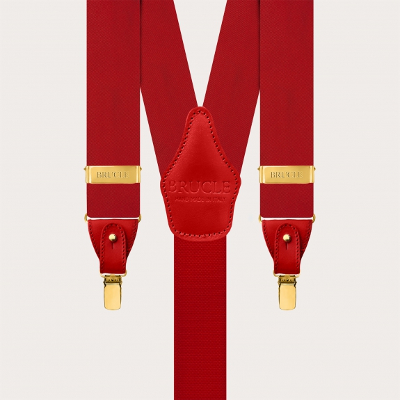 Red silk satin suspenders with gold metal parts for buttons or clips