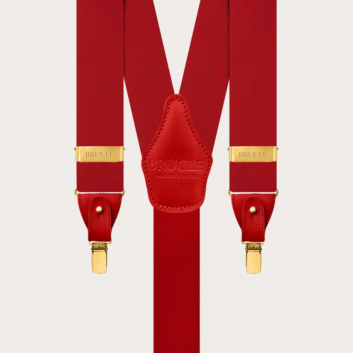 Red silk satin suspenders with gold metal parts for buttons or clips