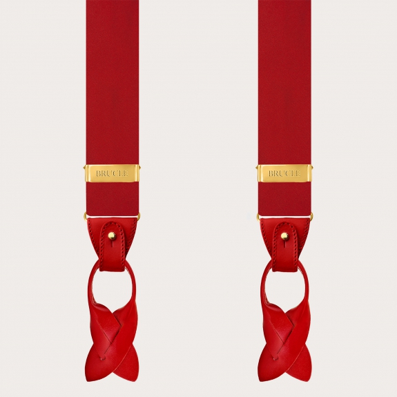 Red silk satin suspenders with gold metal parts for buttons or clips