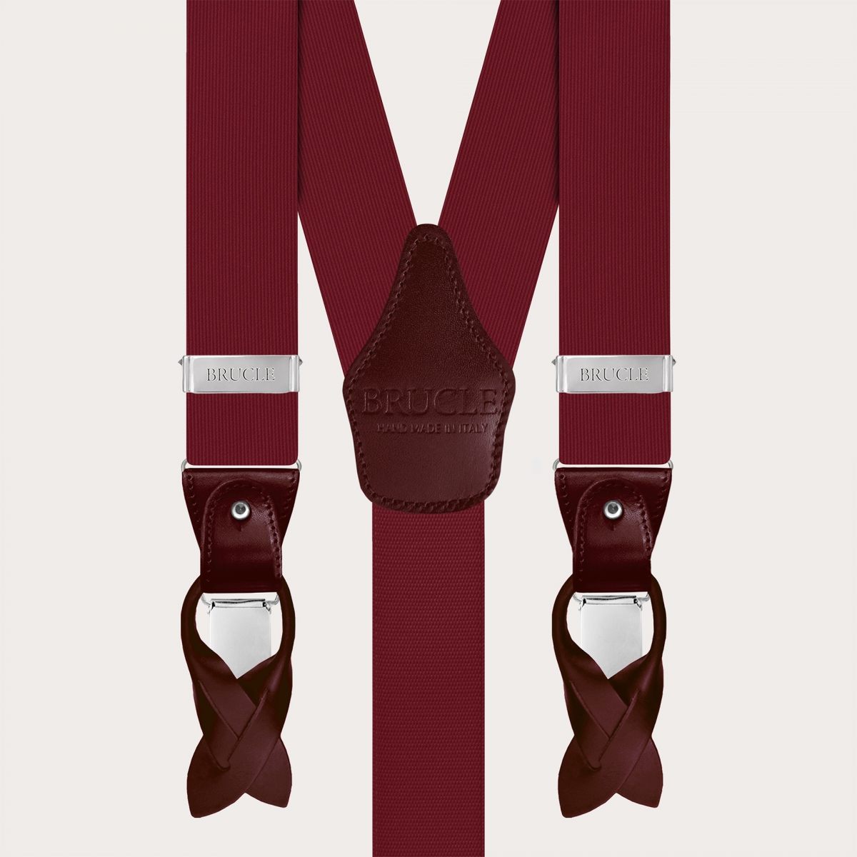 Men's suspenders in burgundy silk with matching leather and silver clips.