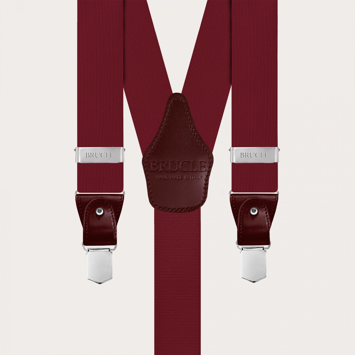 Men's suspenders in burgundy silk with matching leather and silver clips.