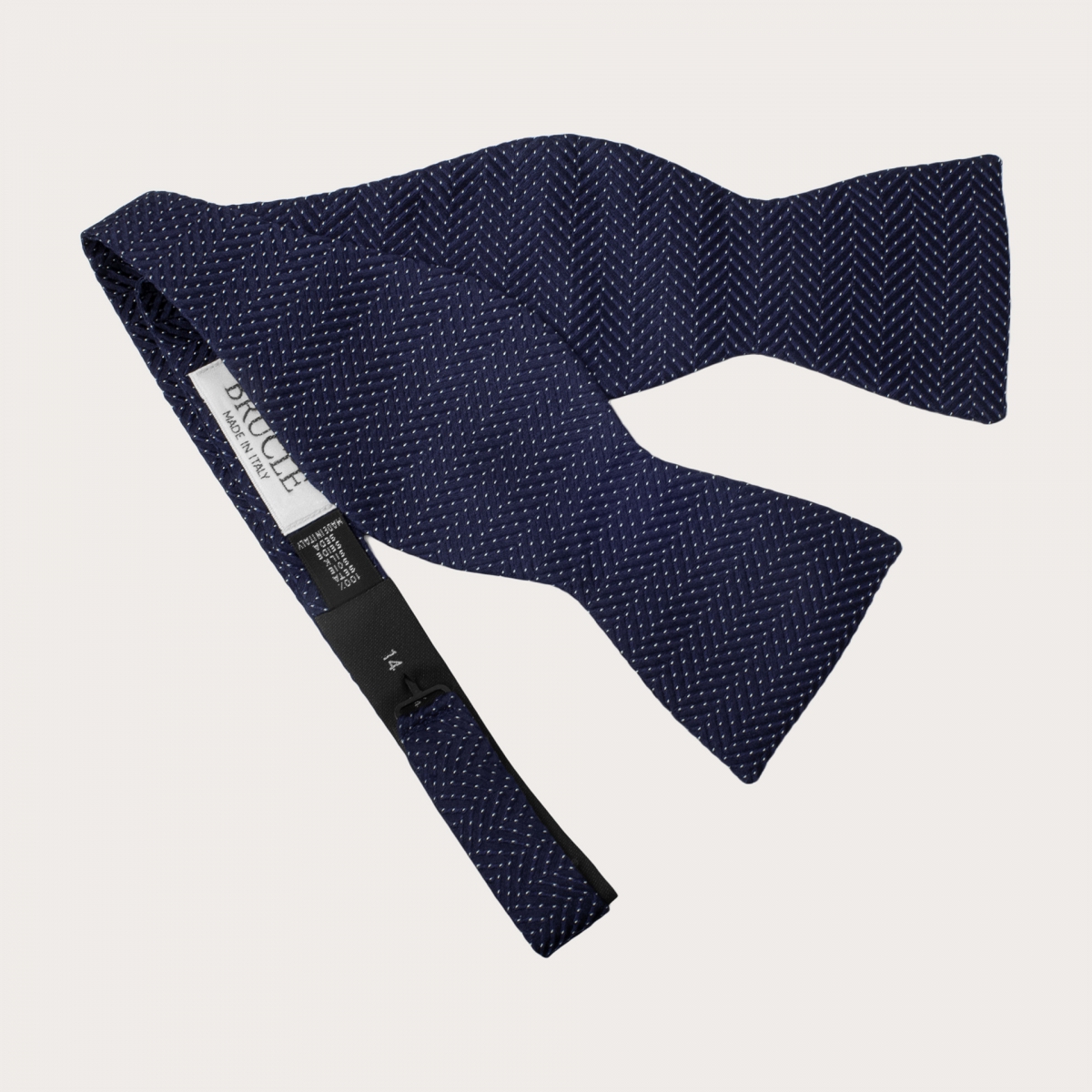 Spotted blue silk self-tie bow tie