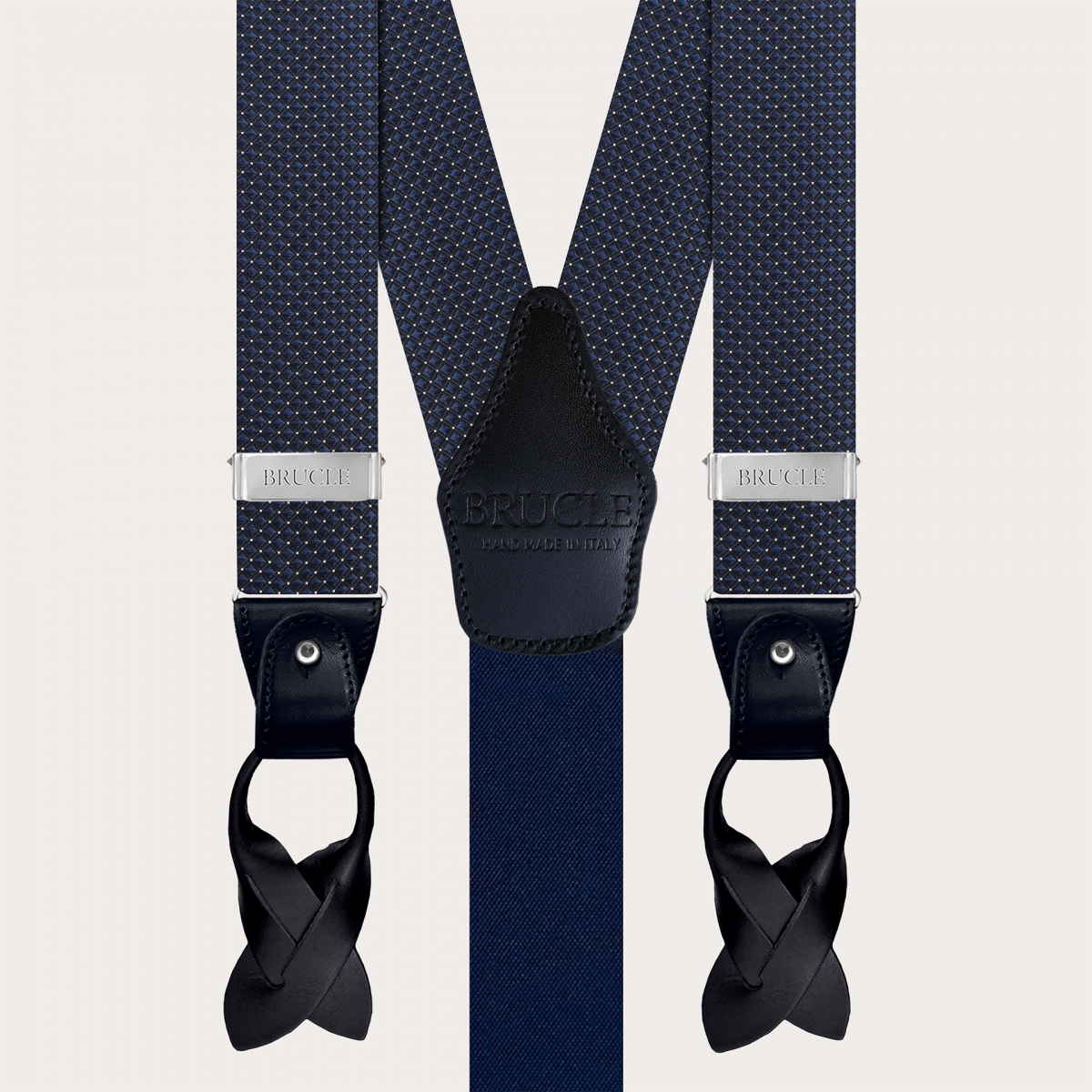 Coordinated set of navy blue silk polka dot suspenders and bow tie