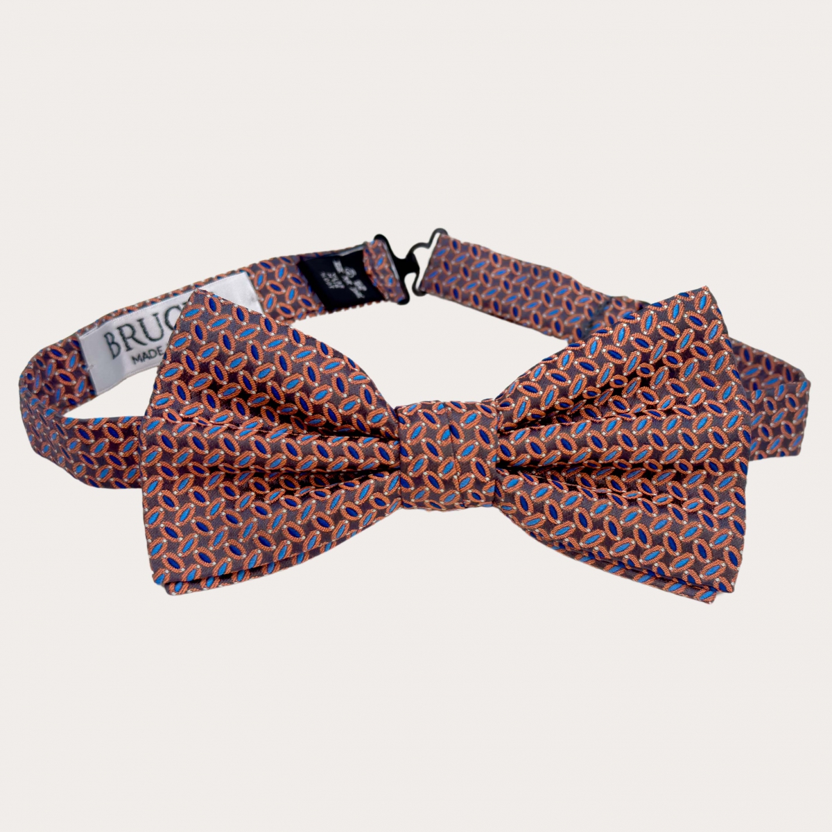 Pre-tied bow tie in brown, orange, and blue silk with a micro pattern