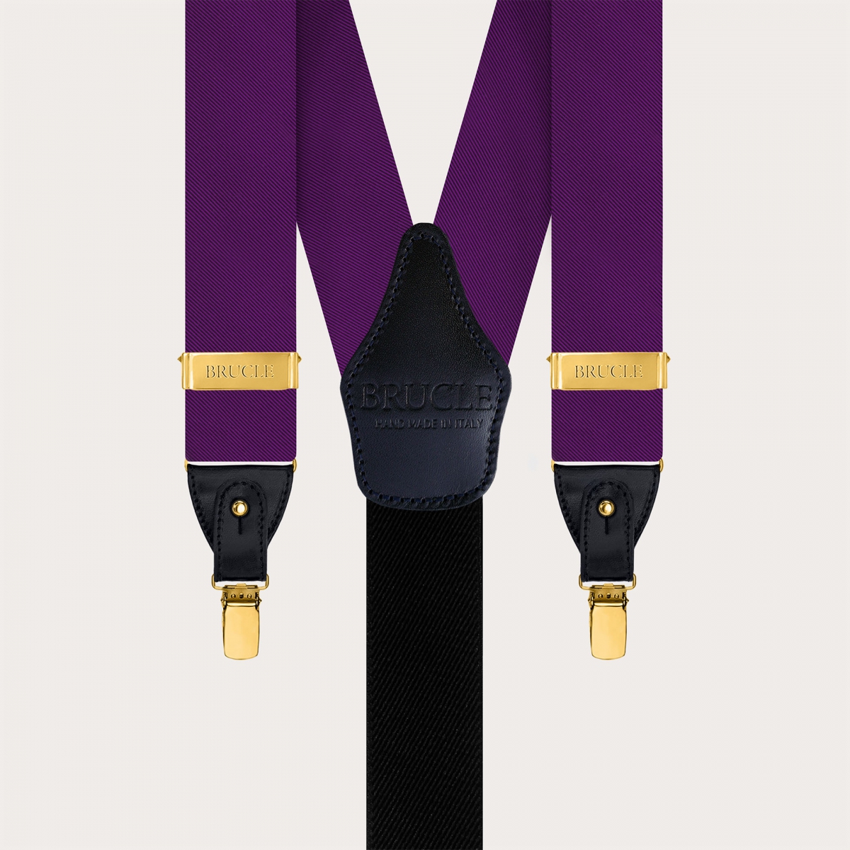 Purple silk men's suspenders with gold metal parts for clips or buttons.